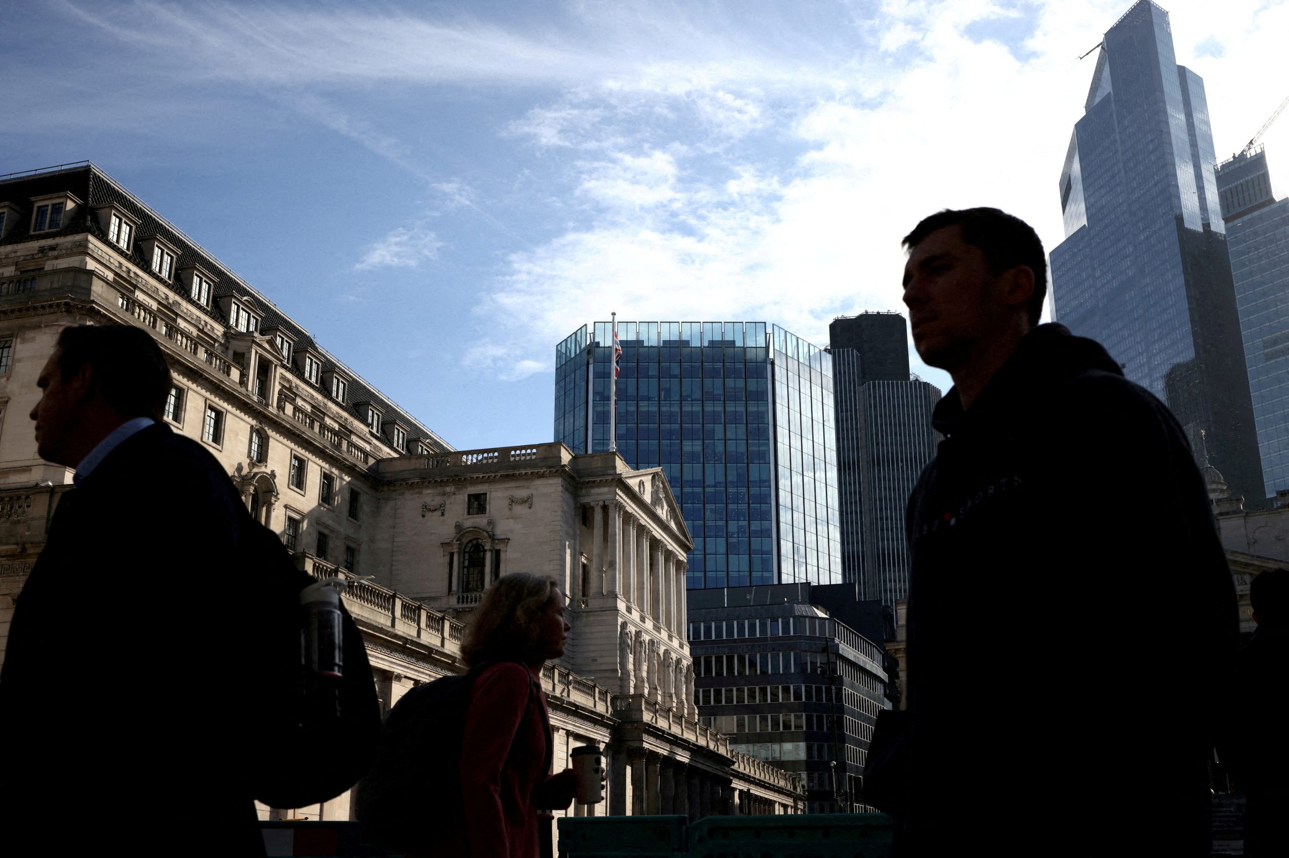 People walk outside the Bank of England in the City of London (Image/Reuters)
