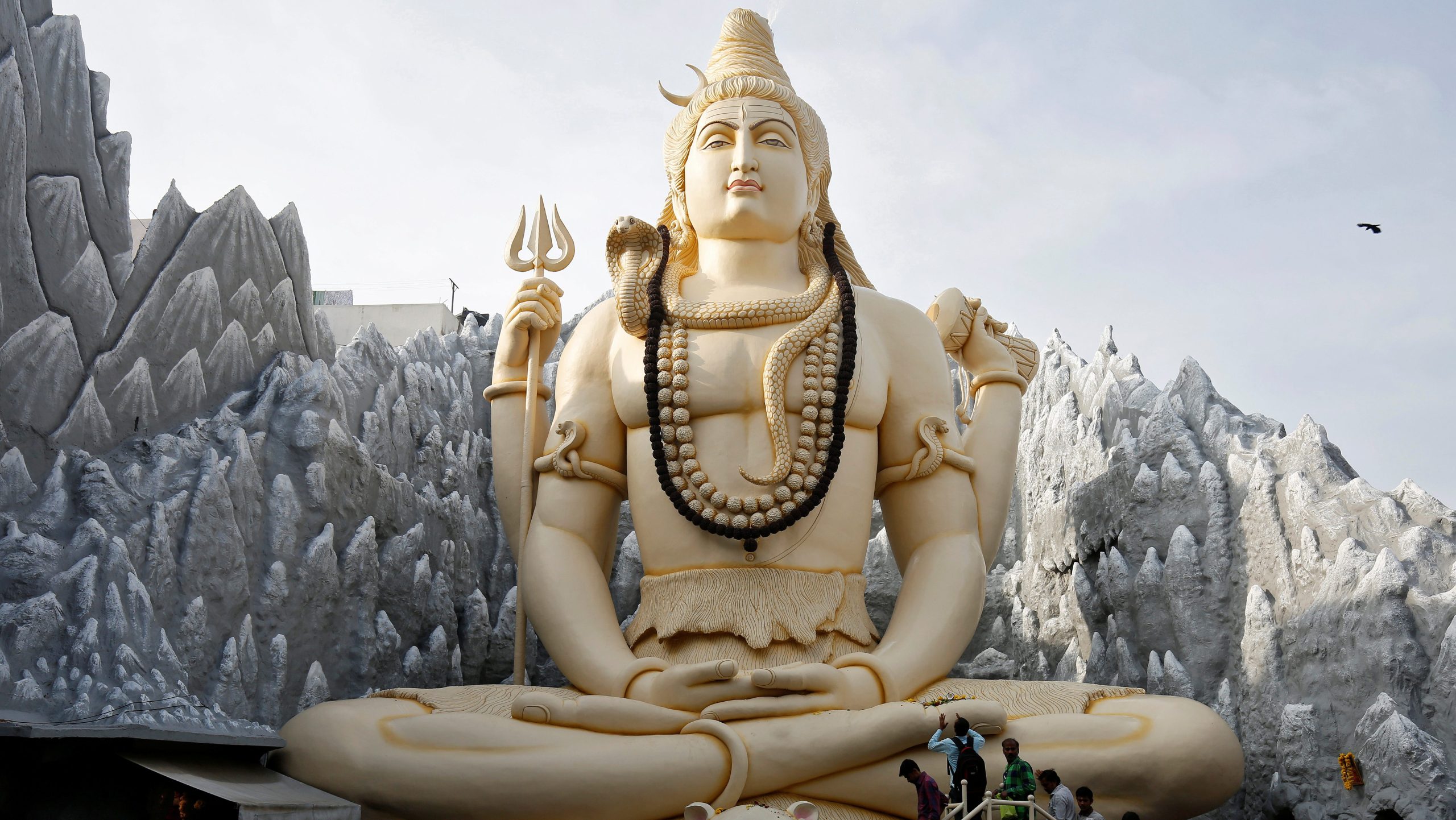 Maha Shivaratri 2024 Puja: Devotees offer prayers and perform rituals in front of a statue of Lord Shiva inside a temple during the Maha Shivaratri festival (Image/Reuters)